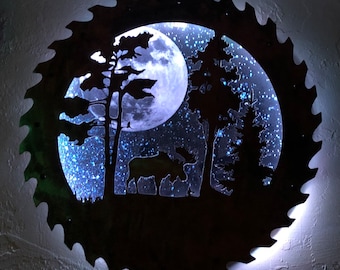 moose under the stars copper saw blade light up light wall decor.