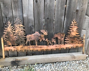 Moose in trees crosscut saw metal wall art
