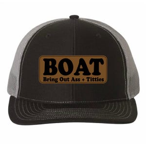 May include: Black and grey trucker cap with a brown rectangular patch. The patch displays the word "BOAT" in bold, brown letters above the phrase "Bring Out Ass + Titties" in smaller brown letters.