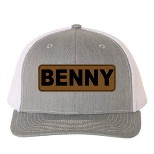 May include: A gray and white trucker hat with the name "BENNY" in bold black letters on a brown rectangular patch. The hat features a gray front panel, a white mesh back, and a curved brim.