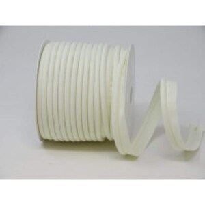 May include: A spool of off-white cotton cord or rope. The cord is wound tightly around a white cardboard spool. The cord is about 1.2 cm wide.