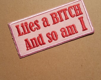 Lifes a bitch and so am I Iron On Patch