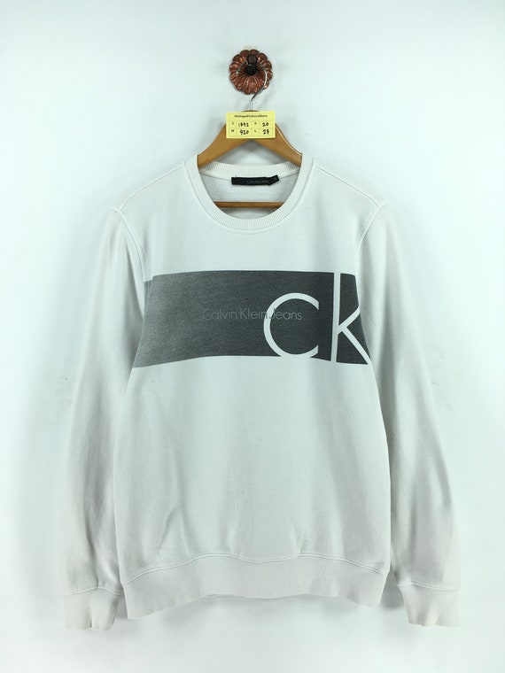 white ck jumper