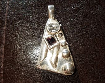 Hand fabricated sterling silver pendant