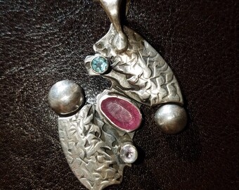 Hand fabricated sterling silver pendant