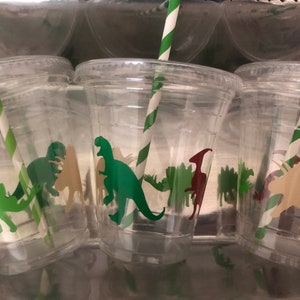 Dinosaur fossils with white paper straws.