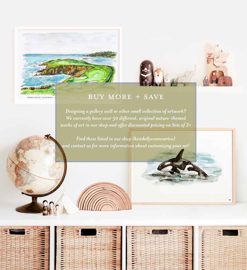 May include: A display of framed art prints and decorative items. The art includes a watercolor of a golf course and an orca whale. Other items include a globe, wooden toys, and a rainbow stacker. Text on the image reads "BUY MORE + SAVE".