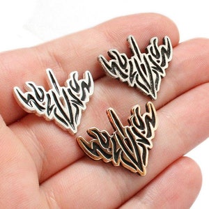 Nan Glyph-reversspeld uit The Stormlight Archive-serie van Brandon Sanderson, bronzen/zilveren Skybreaker-pin, gelicentieerde Way of Kings-sieraden