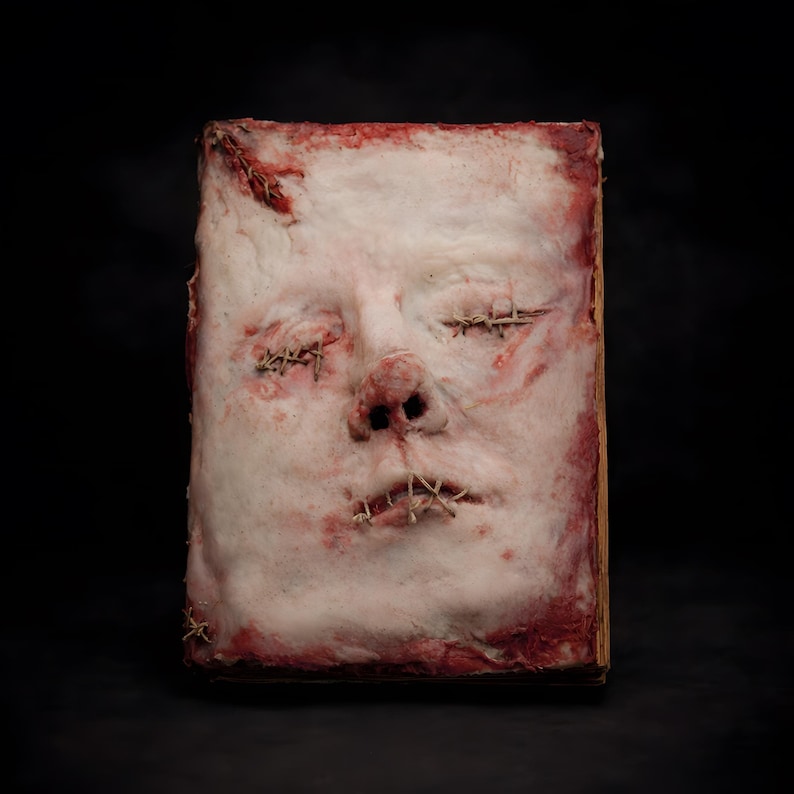 Human skin face book handmade dark art, macabre sculptural book featuring realistic human face relief on skin-textured cover