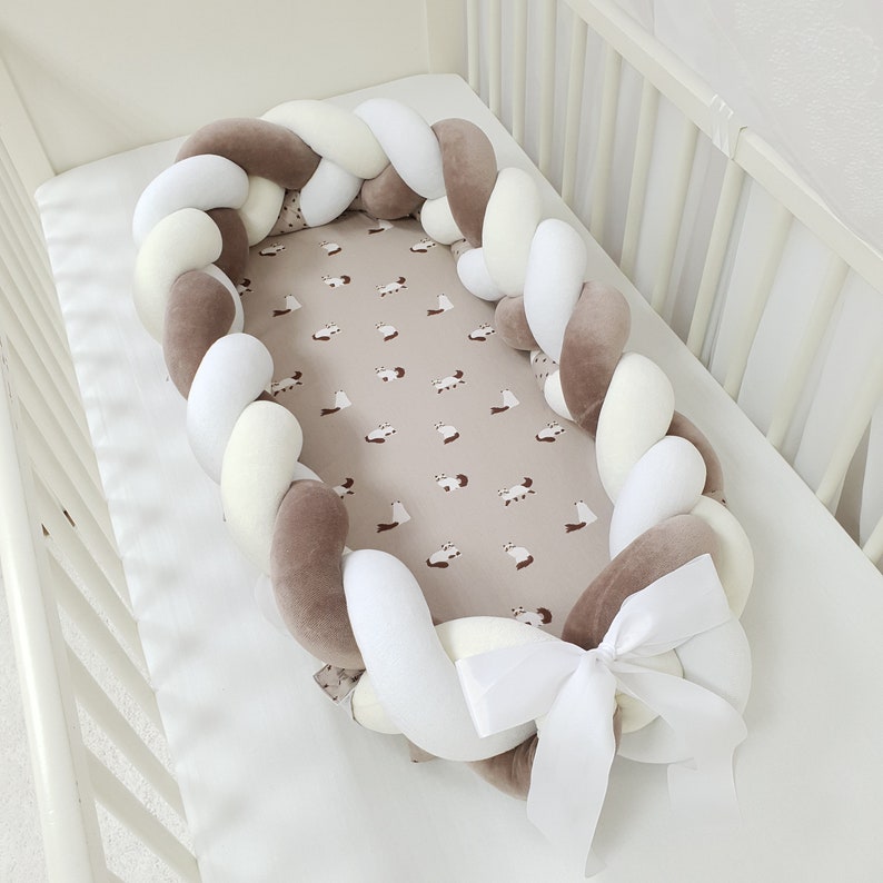 snuggle nest in crib