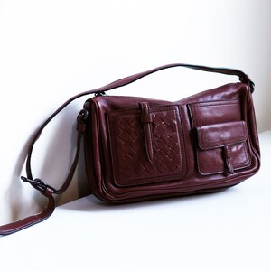 Bottega Veneta Bordeaux Leather Multi Pocket Baguette Bag with Intrecciato Pocket Detail Woven Burgundy Maroon Red 90s Y2K