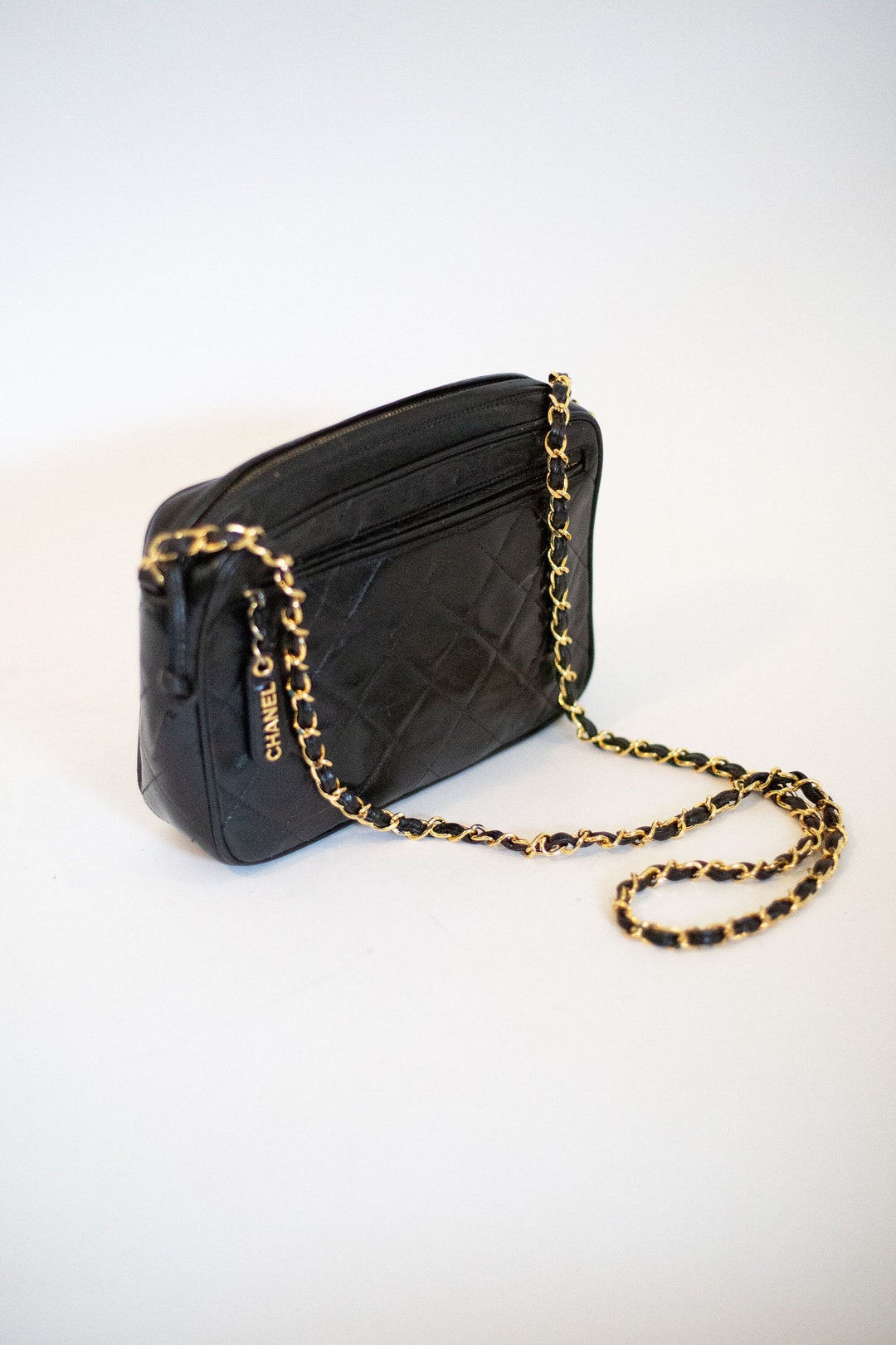 Sold at Auction: Chanel Black and Champagne Chevron Quilted Camera Bag