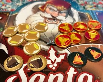 May include: A close-up of a Santa Claus board game with a cartoon illustration of Santa Claus. The game includes various tokens, including brown mugs, red bells, and gold bells. The board game is titled "Santa".