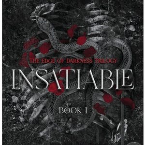 May include: Book cover for "Insatiable," Book 1 of "The Edge of Darkness Trilogy." The cover features a grayscale image of a snake coiled around a rib cage, with red rose petals scattered throughout. The title is in large, bold letters.