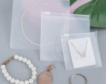 1000 unidades de bolsas de joyería personalizadas con acabado mate y logotipo/marca/texto. Bolsas de joyería transparentes.