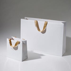 Paper Bag With Logo Jewelry, Gift Bags, custom paper bags logo, Clothes Merchandise Bag, Custom Carrier Bag, Party Wedding Bag, Recyclable.