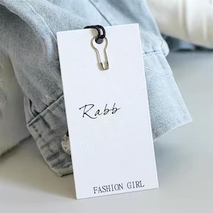 Custom Luxury Garment Swing Tags Clothes Label Print Name Logo Plastic Hang Tag With String Paper Hangtags for Clothing Own Logo