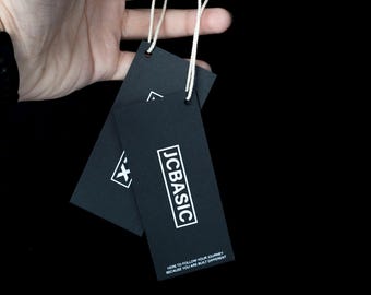Etichette per abbigliamento personalizzate con logo nero, cartellini personalizzati, etichette pendenti, etichette per design di packaging, etichette del marchio, etichette del prezzo, etichette per abbigliamento