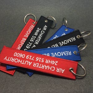 Personalised BOY FLYING AN AIRPLANE Keyring Bag Tag Personalised BOY FLYING AN AIRPLANE Keyring Bag Tag