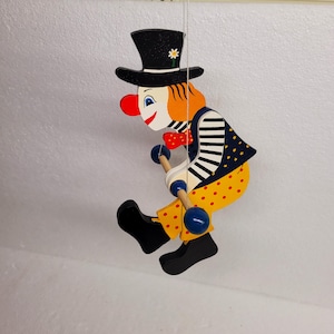Spinning clown mobile