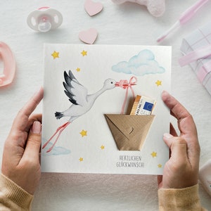 Tarjeta de nacimiento, cigüeña con regalo de dinero, rosa