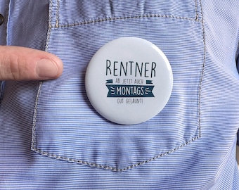 May include: White button with blue text that reads "Rentner ab jetzt auch =Montags= Gut gelaunt!"