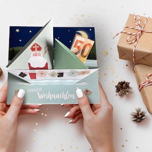 Eine etwas andere Weihnachtskarte / Geldgeschenk: "Santa im Boot", handgefaltet