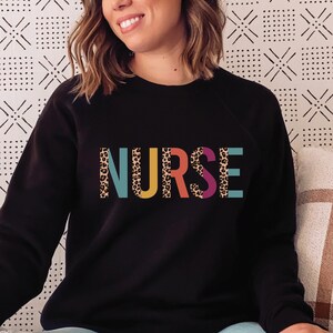 Nurse sweatshirt, leopard print nurse shirt for new nurse life sweatshirt, registered nurse gifts for emergency nurses, rn nurse grad gift,