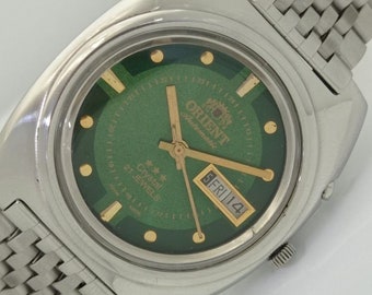 Genuine Vintage Orient crystal automatic 46940 japan mens day/date green dial wrist watch 621a-a413474-1