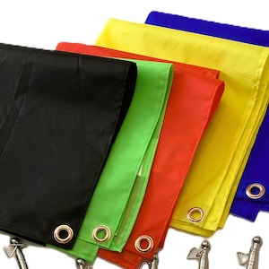 May include: Set of six fabric flags in black, green, red, yellow, and blue. Each flag has a metal grommet and is attached to a silver metal pole.
