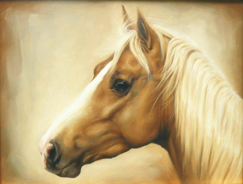 May include: A close-up portrait of a palomino horse with a white mane and tail. The horse is looking to the side with its head tilted slightly down. The background is a soft, light brown.