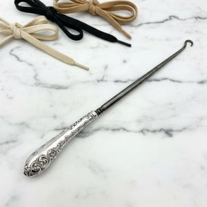 Gancio antico vittoriano con bottone, manico in argento sterling