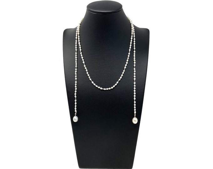 A Stunning Freshwater Pearl Lariat Necklace With Diamond Cut Micro Beads