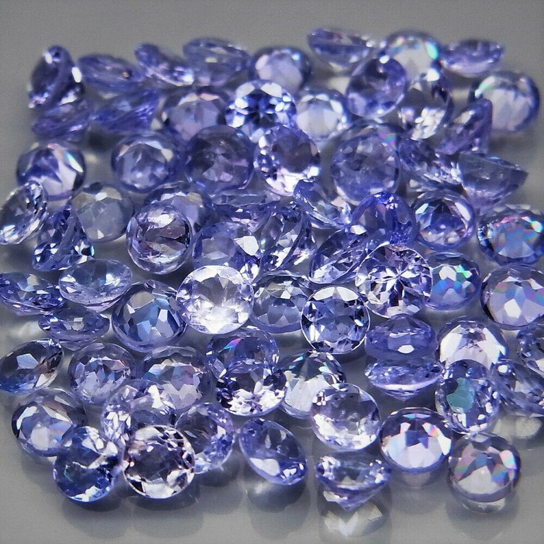 purplish blue round cut 5.24ct. natural Tanzanite gemstones top quality in ravishing color /& full fire 70 pcs