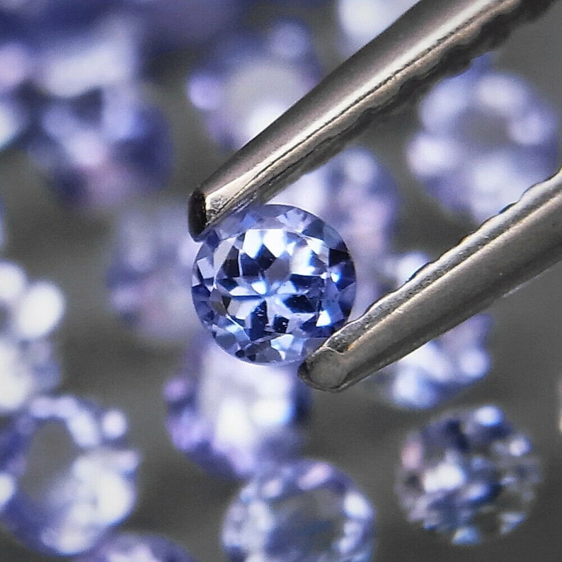 purplish blue round cut 5.24ct. natural Tanzanite gemstones top quality in ravishing color /& full fire 70 pcs