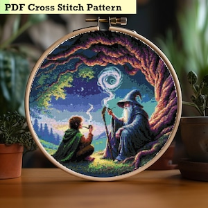 May include: A cross stitch pattern featuring a wizard and a hobbit sitting under a tree, smoking pipes. The scene is set at night with a starry sky and a swirling cloud of smoke.
