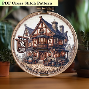 May include: A cross stitch pattern of a medieval-style building with a sign that reads "Prancing Pony". The building is brown and white with a blue roof and has several windows. The building is surrounded by a cobblestone street.