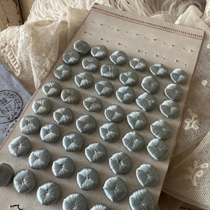 Stunning antique 1920s French button card with 48 dainty buttons in baby blue image 1