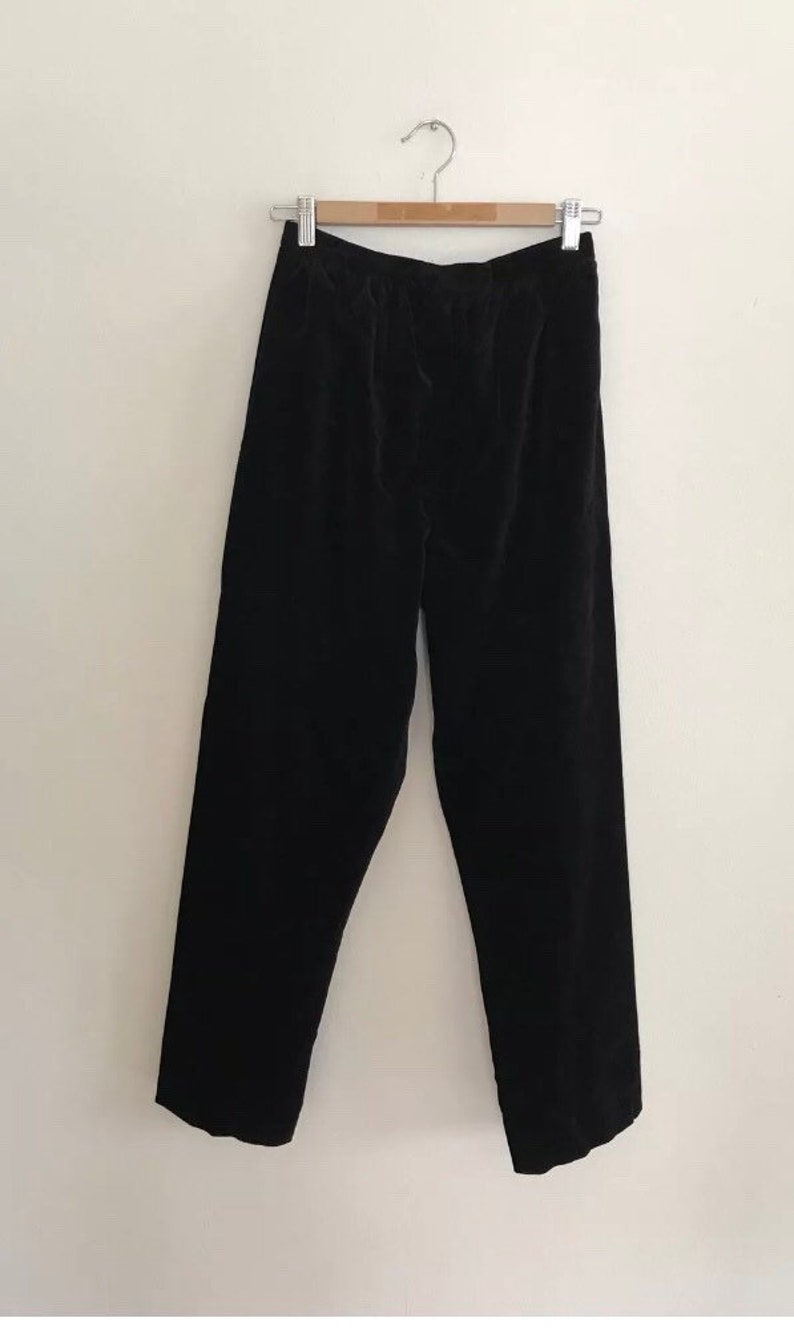 Halston Black velvet high waisted pants.