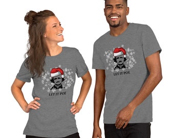 May include: A gray t-shirt with a white snowflake pattern and a cartoon image of Edgar Allan Poe wearing a Santa hat. The text "Let it Poe" is printed below the image.