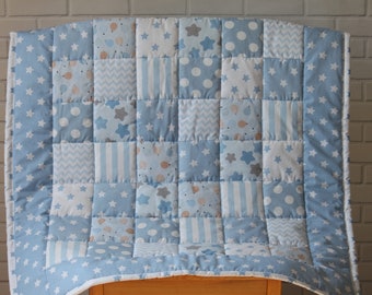 Patchwork Baby Quilt. Cozy and Colorful Nursery Bedding in Blue colors.