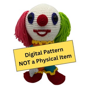 May include: A handmade crochet clown doll with a white head, red nose, and a red smiling mouth. The clown has pink and green hair, blue eyes, and a colorful outfit. The text on the image reads "Digital Pattern NOT a Physical Item."