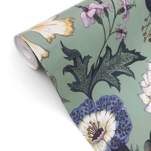 May include: A roll of green wallpaper with a floral pattern featuring blue, white, and yellow flowers. The flowers are surrounded by green leaves.