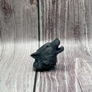 Howling Wolf Tire Valve Stem Cap that fits typical tire valves