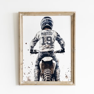 May include: A black and white illustration of a person wearing a helmet and riding a dirt bike. The person is wearing a jersey with the name "Mateo" and the number "19" on the back. The background is a white watercolor wash.