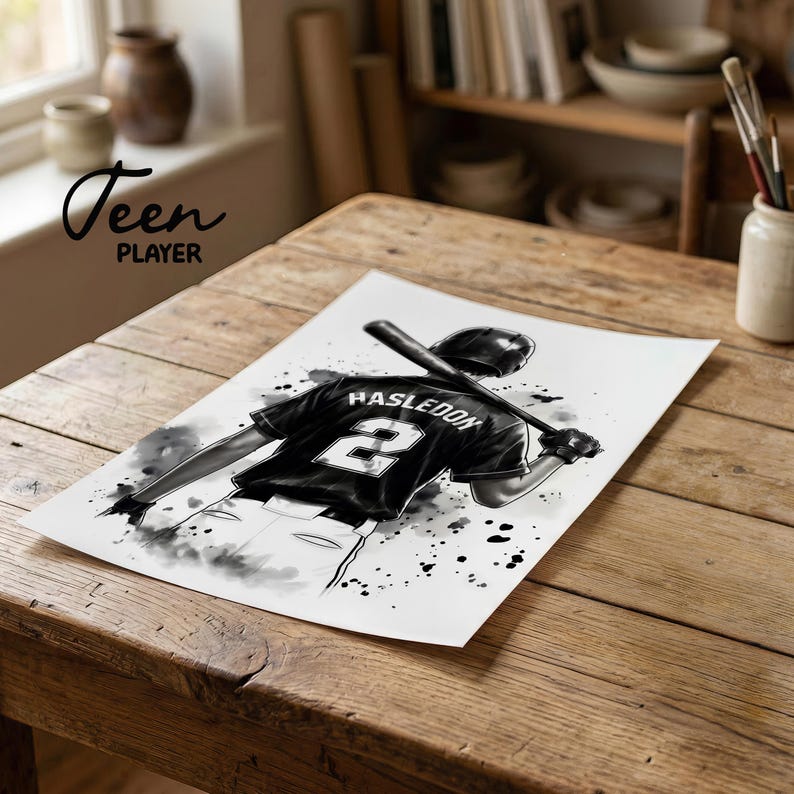 May include: A black and white art print featuring a baseball player seen from behind, wearing a jersey with the name HASLEDON and the number 2. The player holds a baseball bat over their shoulders, rendered in a stylized ink splatter aesthetic.