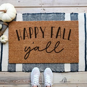 doormat that says happy fall yall