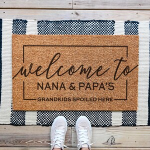 custom grandparents doormat that says welcome to nana and papa's house. Grandkids spoiled here