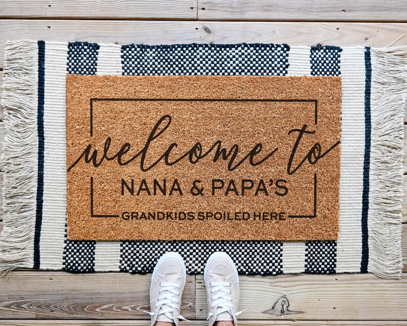 custom grandparents doormat that says welcome to nana and papa's house. Grandkids spoiled here