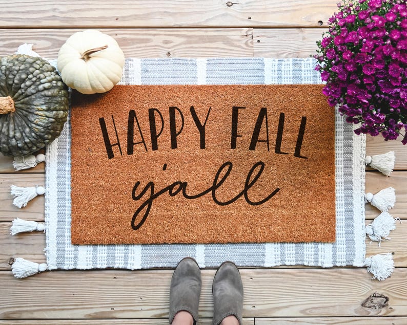 doormat that says happy fall yall